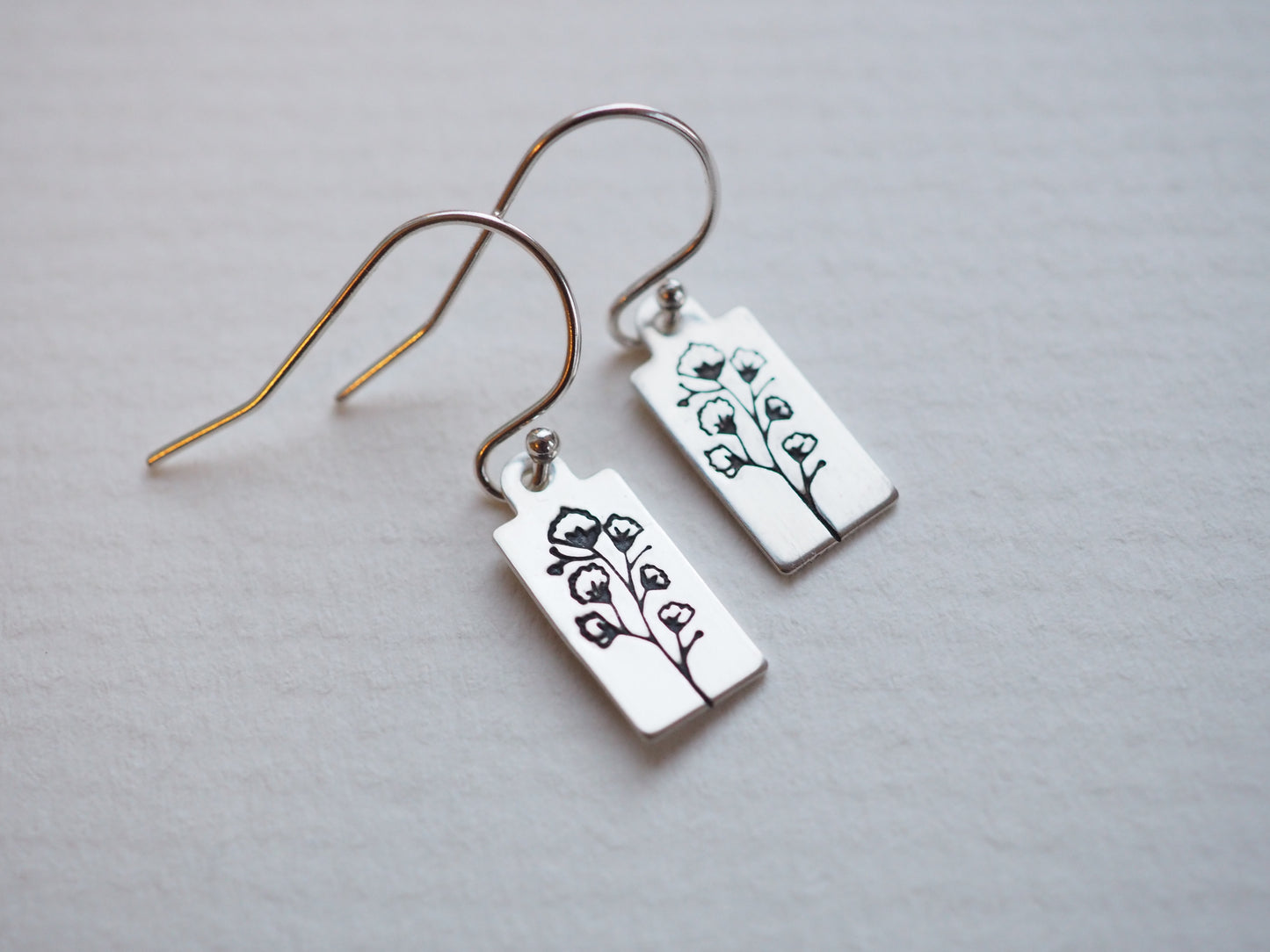 SILVER HAND STAMPED FLORAL TAG EARRINGS