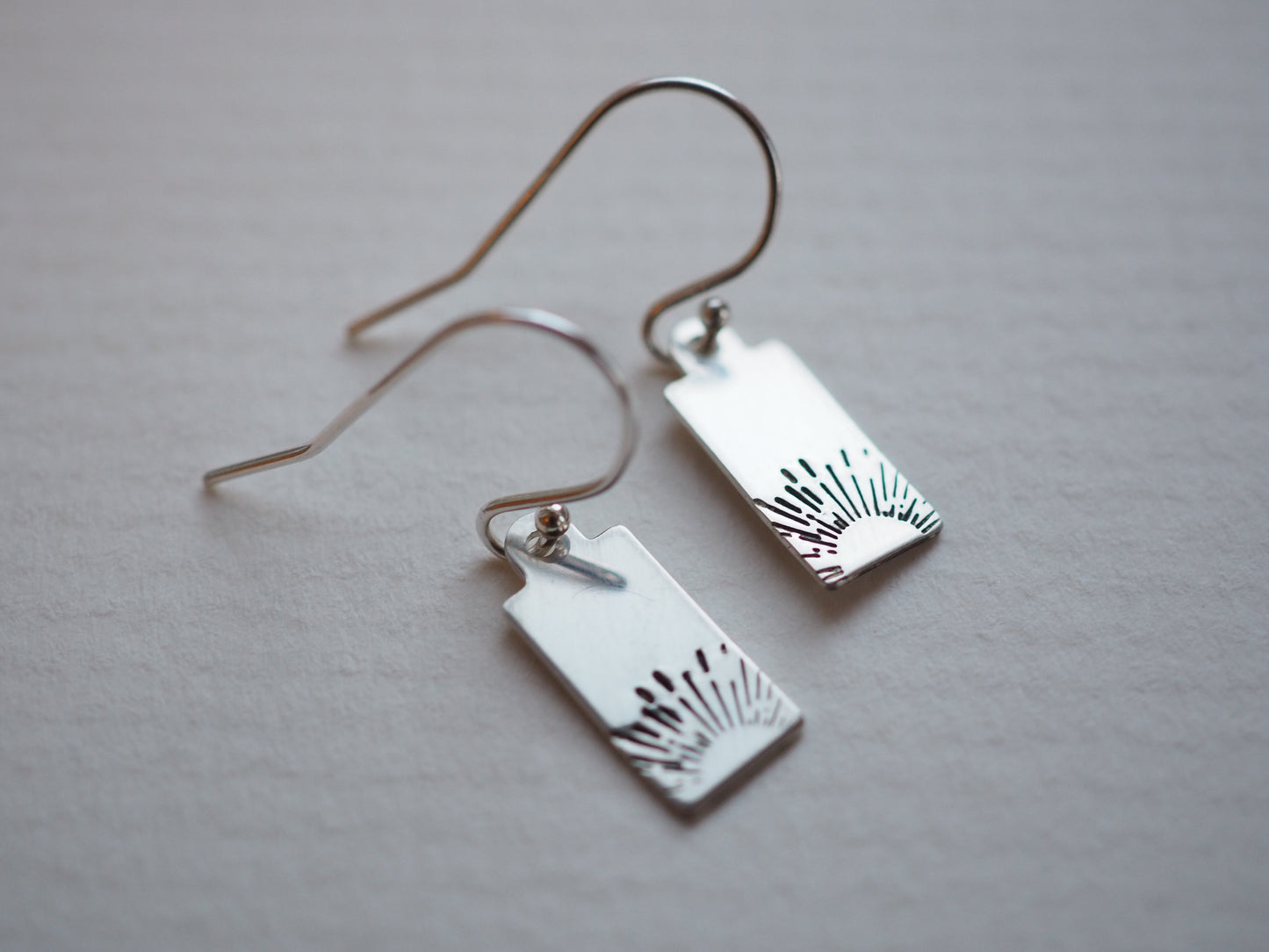 SILVER HAND STAMPED SUNRISE TAG EARRINGS